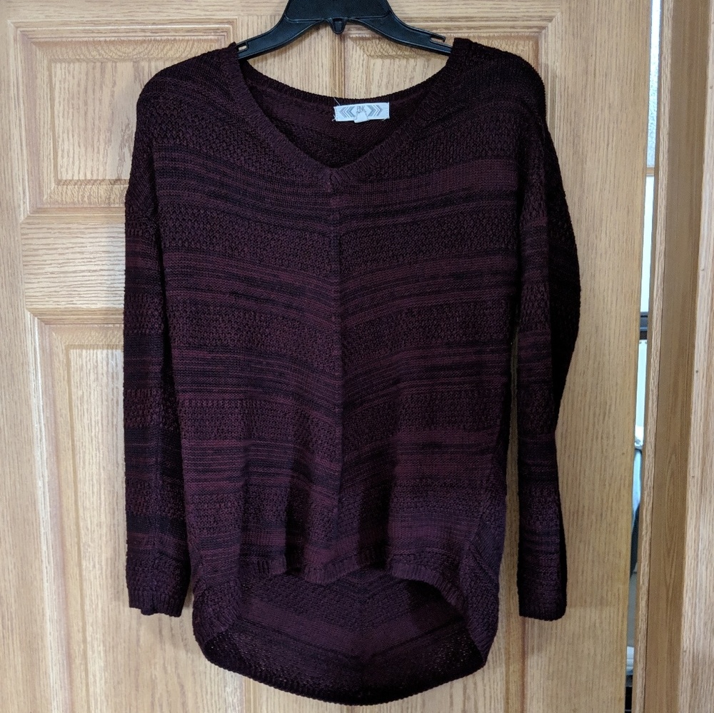 Purple and black striped high-low sweater